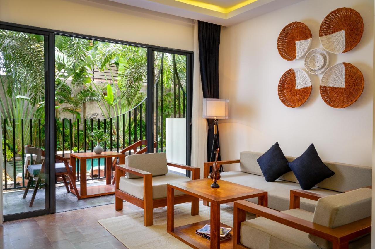 The Thirdfold Residence Ciudad de Siem Riep Exterior foto A living room at the resort